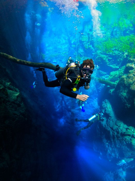 Diving in the crystal clear waters of Lagoa Misteriosa. Unknown depth and incredible visibility.